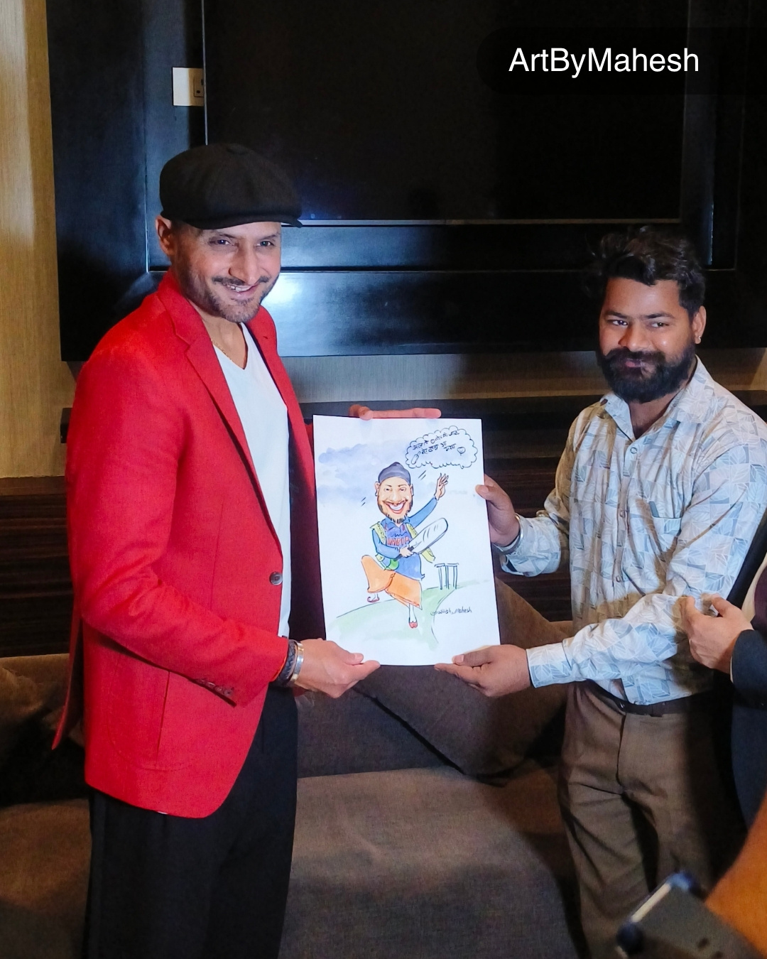 Caricature artist Mahesh Kumawat presenting a hand-drawn caricature to Harbhajan Singh at a live event